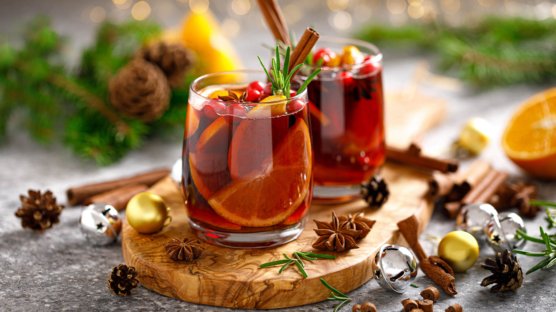 mulled wine surrounded by spices