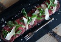 Beef Carpaccio with Baby Arugula & Shaved Asiago